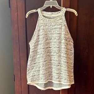 Women's halter style top with fringe hem